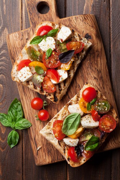 Bruschetta with tomatoes mozzarella and basil