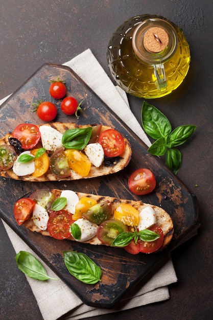 Bruschetta with tomatoes mozzarella and basil