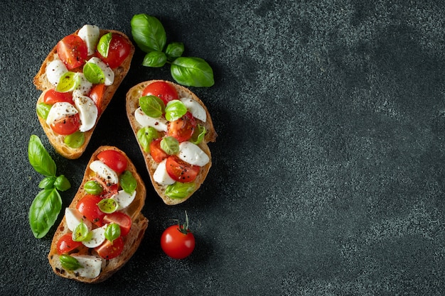 Bruschetta with tomatoes, mozzarella and basil.