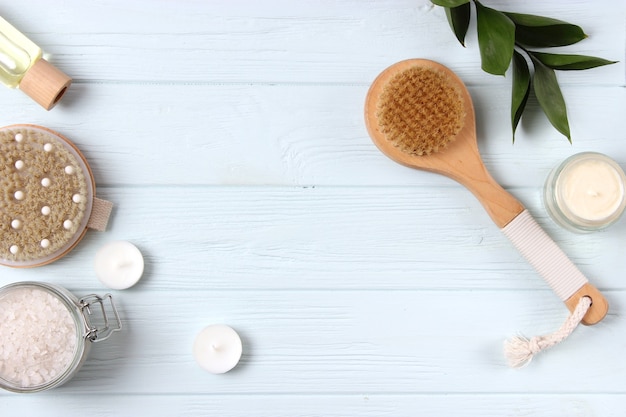 Brush for dry massage on a colored background top view