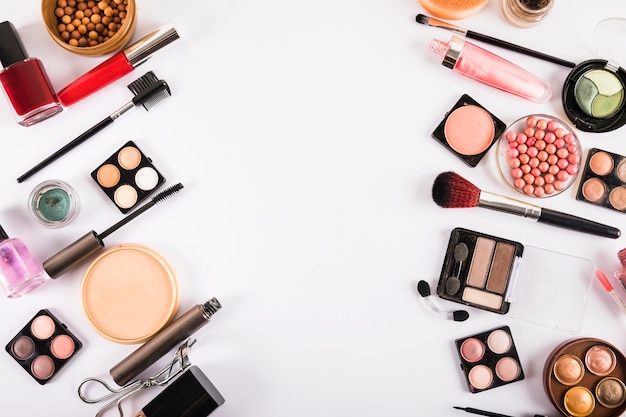 Brushes and cosmetics isolated on a white background