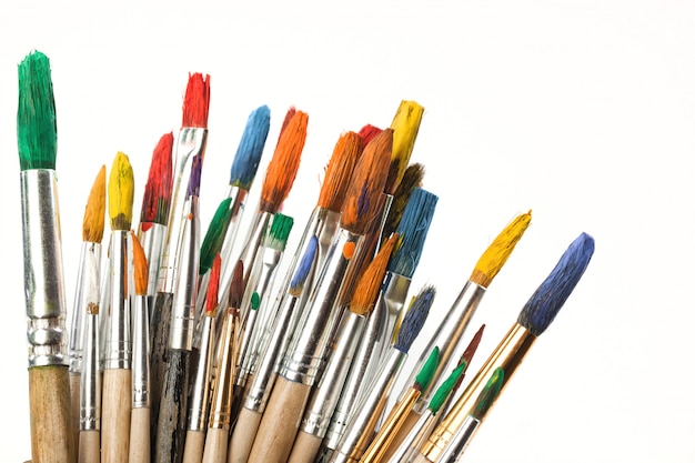 Brushes and paints for drawing in composition on the table