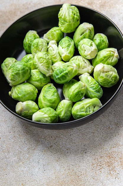 Brussels sprouts green raw vegetable healthy meal food snack diet on the table copy space food