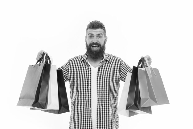 Brutal caucasian hipster with moustache Bearded man with shopping bags Shopping sale Male barber care Black Friday Cyber Monday Mature happy hipster with beard savings on purchases