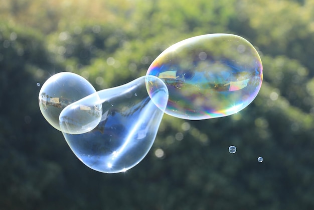 bubble blower on blue sky background