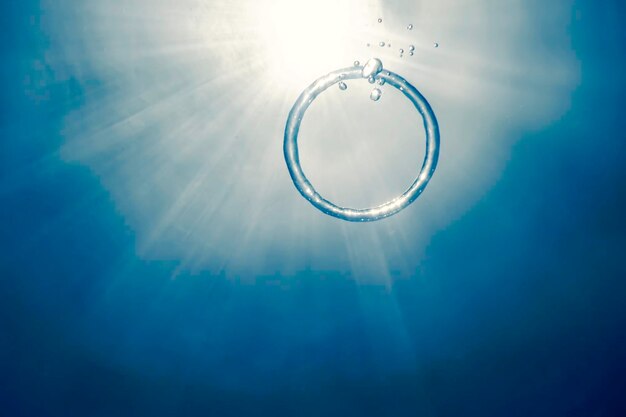 Photo bubble ring underwater ascends