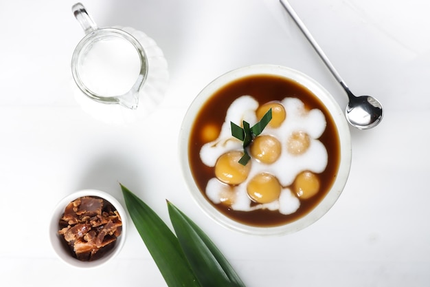 Bubur Candil, made from sticky rice flour, brown sugar, rice flour and coconut milk.