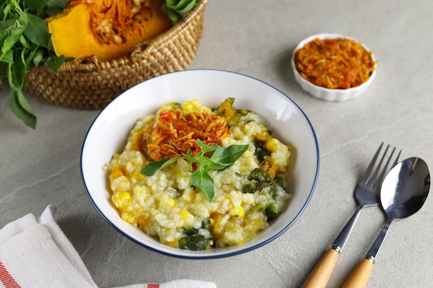 Bubur Manado traditional rice porridge mixed with pumpkin corn vegetables