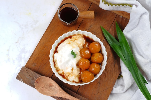 Bubur Sumsum Biji Salak or bubur Candil, Indonesian rice flour porridge with sweet potato glutinou