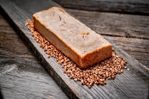 Buckwheat bread. Freshly baked traditional bread on wooden table.