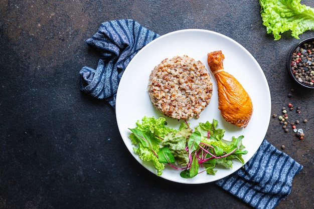 buckwheat chicken leg salad porridge leaves green lettuce mix fresh