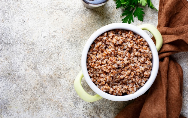 Buckwheat porridge in green pot