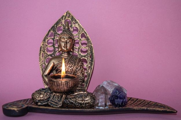 Buddha craft with candle and gems