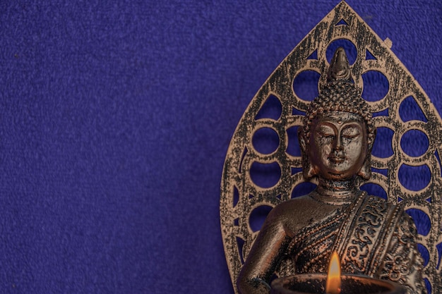 Buddha craft with candle and gems