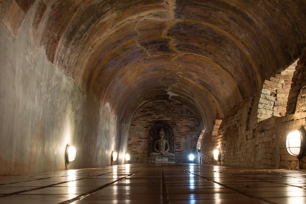 Buddha statue in the old cave of Wat Umong Suan Puthatham Chiang Mai Thailand