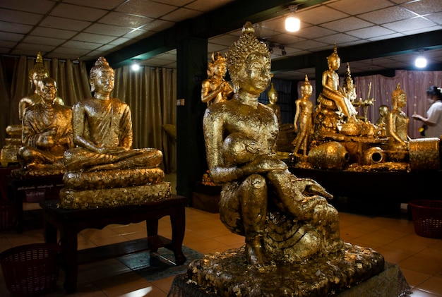 Buddha statue variety attitude for thai people travelers travel visit and respect praying and rite ritual merit for blessing holy worship at Wat Maniwong or Mani Wong temple in Nakhon Nayok Thailand