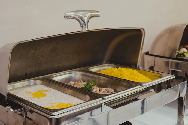 Buffet trays with a various breakfast hotel meals