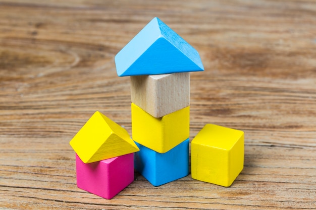 Building blocks on wooden background，Colorful wooden building blocks