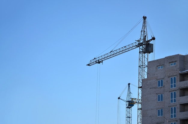 Building under construction with crane