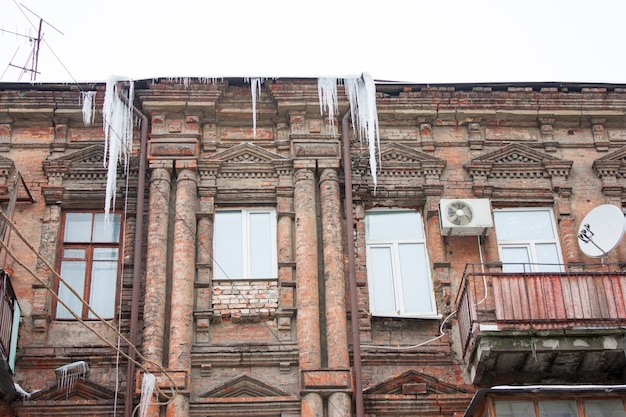 Building covered with big icicles