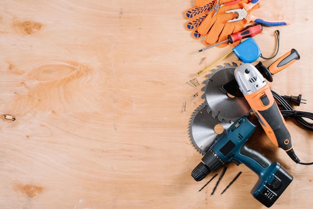 Building and crafting instruments and tools on the wooden background