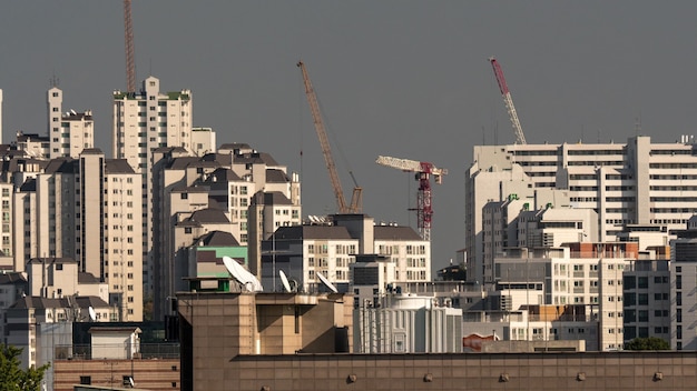 Of building cranes working in seoul south korea