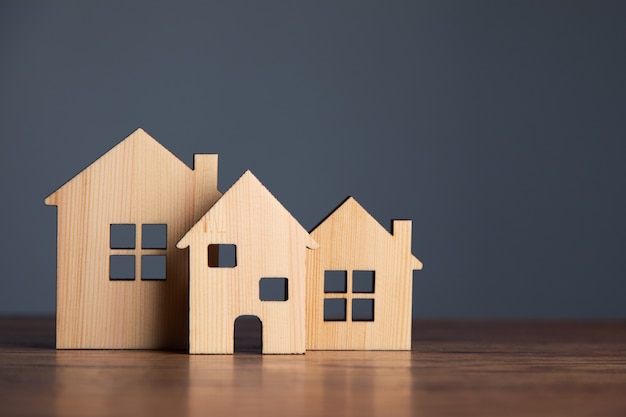 Building different wood house model on the table