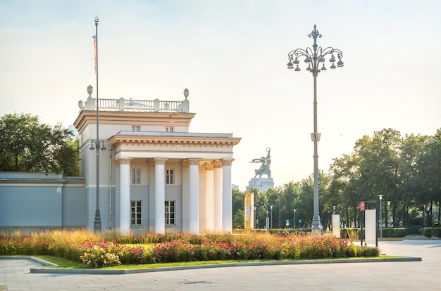 The building of the entrance to the territory and the monument to the Worker and Kolkhoz Woman VDNKh Moscow