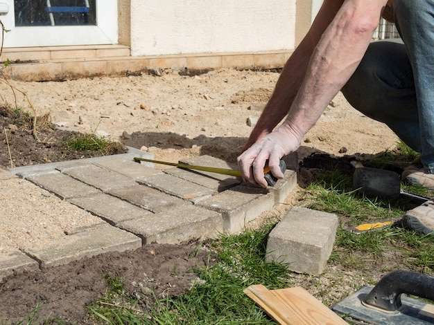 Building a terrace with measurements ruler paving stone