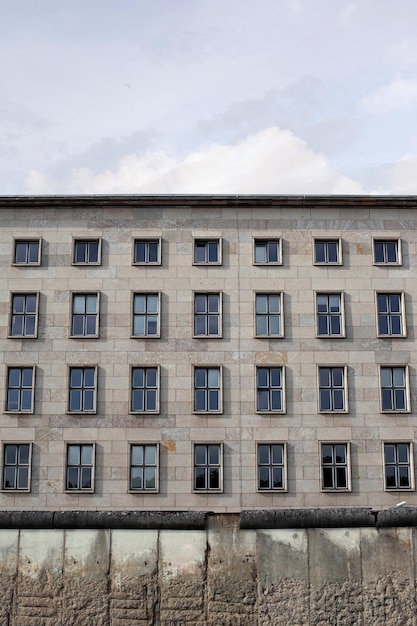 Building and wall in the GDR seen from the FRG