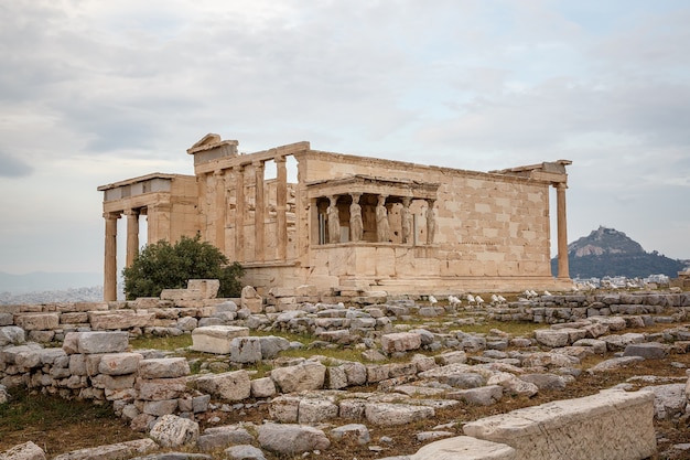 Building with Figures of Caryatids Porch of the Erechtheion on the Parthenon on Acropolis Hill, Athens, Greece.