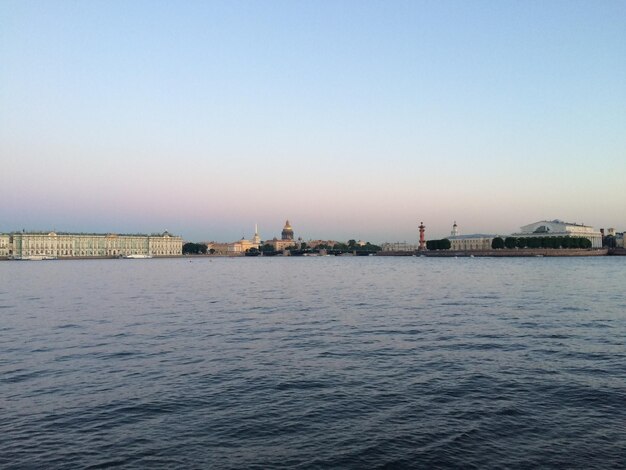 Built structures in water at sunset