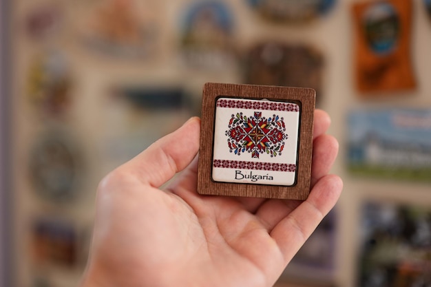 Bulgaria souvenir refrigerator magnet at hand