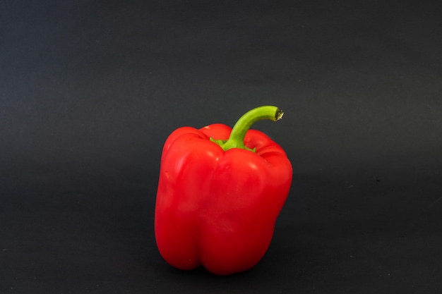 Bulgarian pepper on a black background Bulgarian red pepper