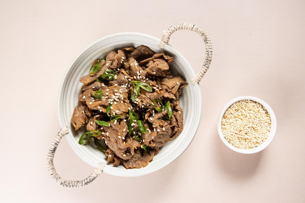 Bulgogi is Korean style grilled or roasted dish made from marinated slices of meat.