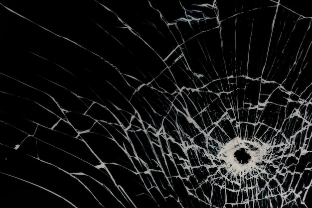 bullet hole on glass black background for overlay, transparent window