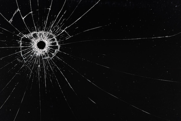 bullet hole on glass black background for overlay, transparent window