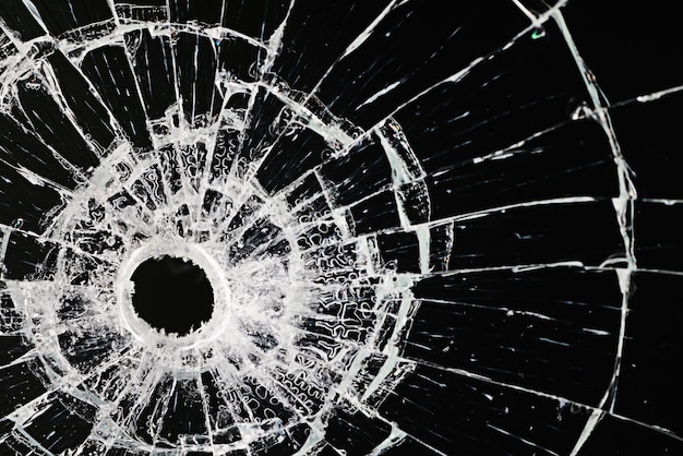 bullet hole on glass black background for overlay, transparent window