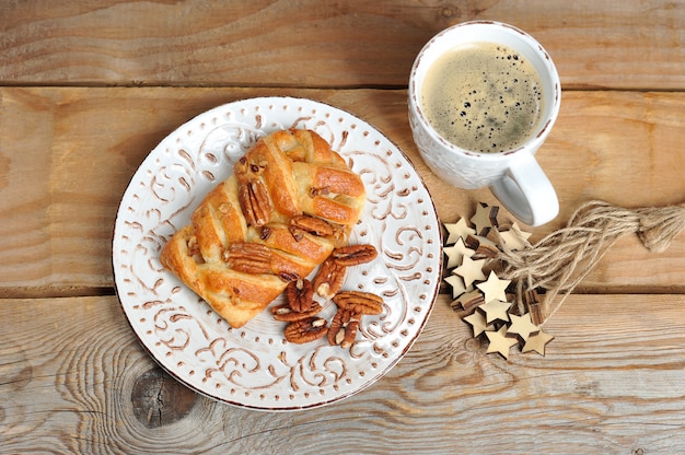 Bun with pecan and coffee