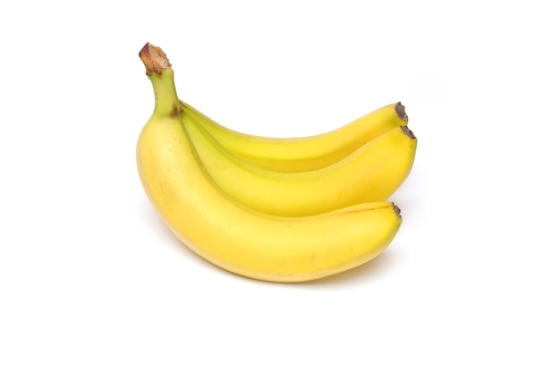 A bunch of bananas on a white background