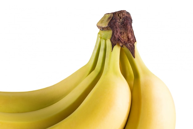 A bunch of bananas on a white surface