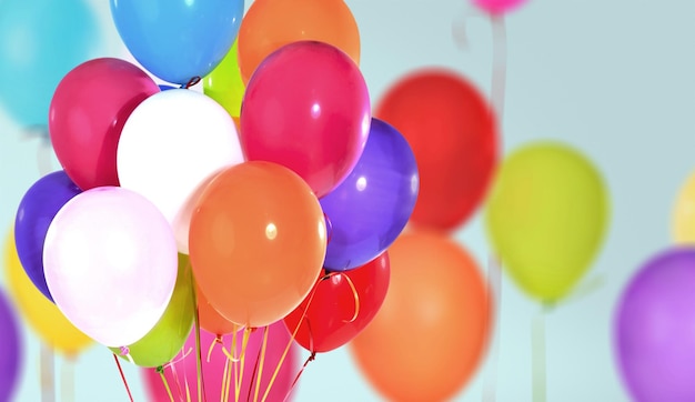 Bunch of colorful balloons on  background