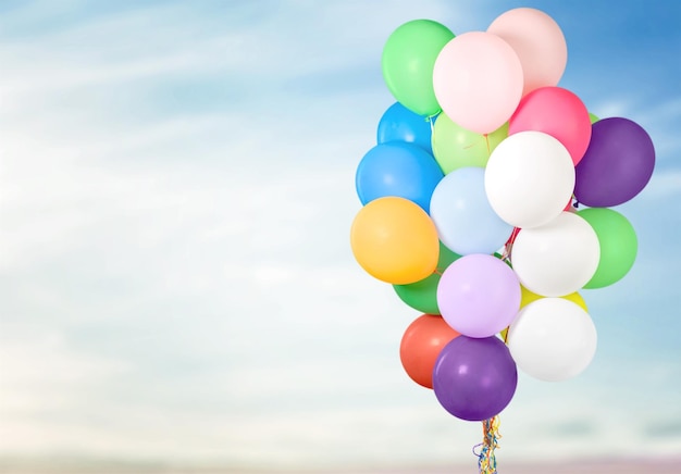 Bunch of colorful balloons on  background