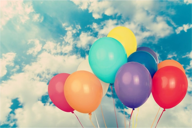 Bunch of colorful balloons on  background