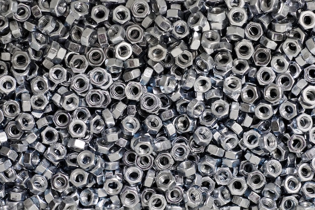 Bunch of galvanized hexagon nuts for bolts for fasten multiple parts together hardware fasteners