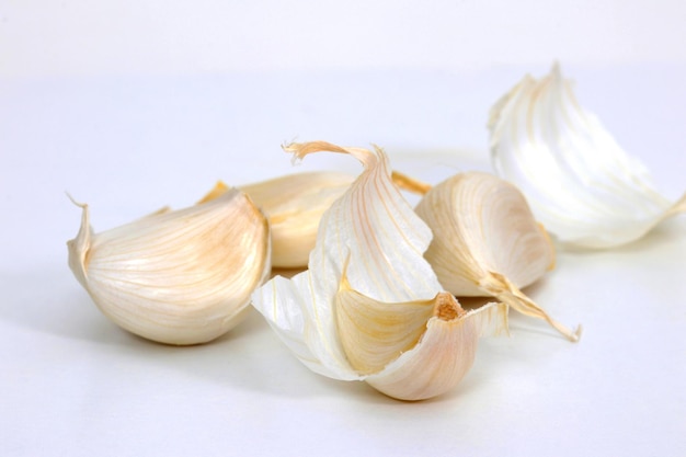 A bunch of garlic on a white background