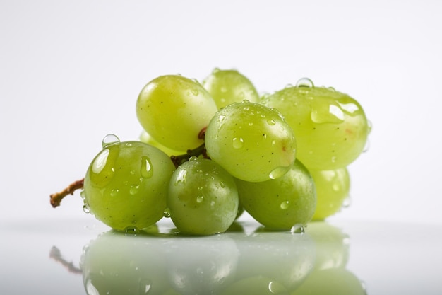 A bunch of grapes with water droplets on it