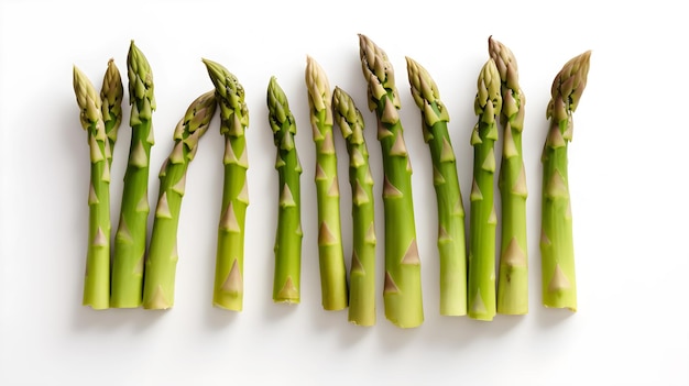 bunch of green asparagus on white background top view