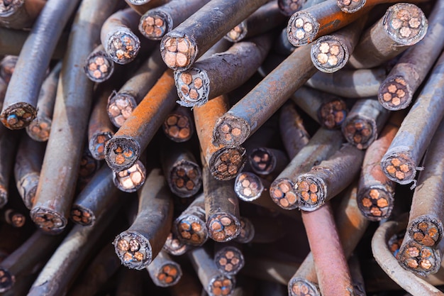 A bunch of old copper cables in a plastic sheath Front view