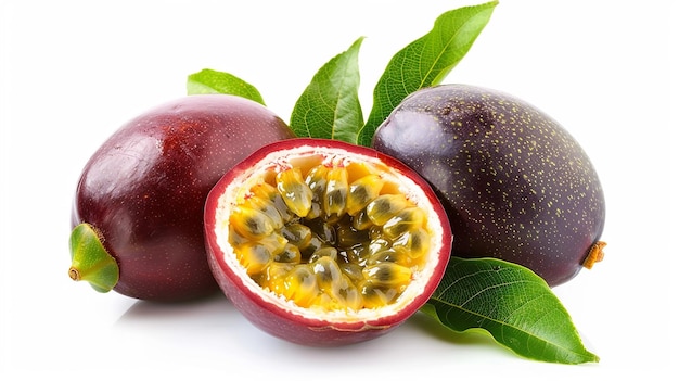 Photo a bunch of passion fruit with leaves and a green leaf